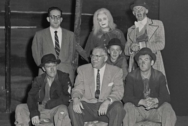 Director Herbert Blau, warden FR Dickson, and the cast of 1957 San Quentin performance of Waiting for Godot